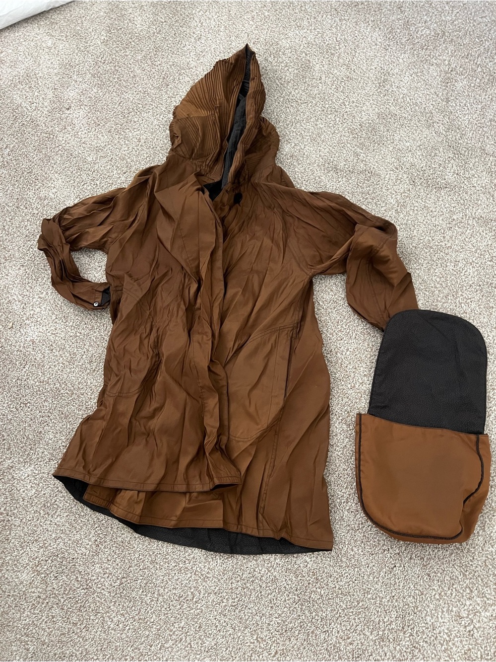 NWOT Mycra pac reversible packable rain jacket. Brown and then black and bro
